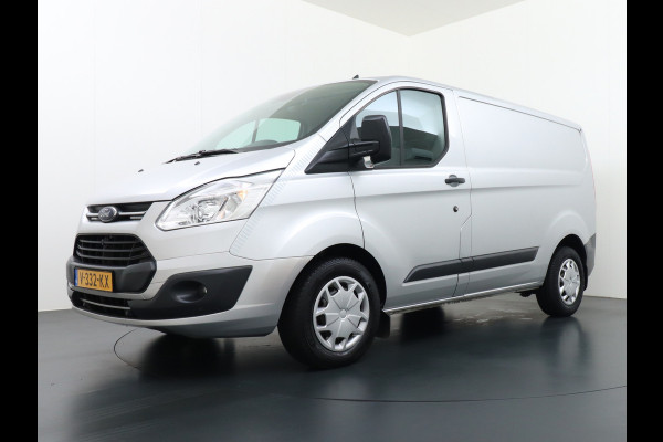 Ford Transit Custom Automaat 290 2.0TDCI 131PK L1H1 Navi Airco Cruise Camera Trekhaak Pdc Regen-/lichtsensor Euro 6 Trend Bluetooth Voorruit verwarmbaar Achterklep Zijschuifdeur Wandbetimmering Adaptieve bochtverl 1e Eigenaar Euro 6