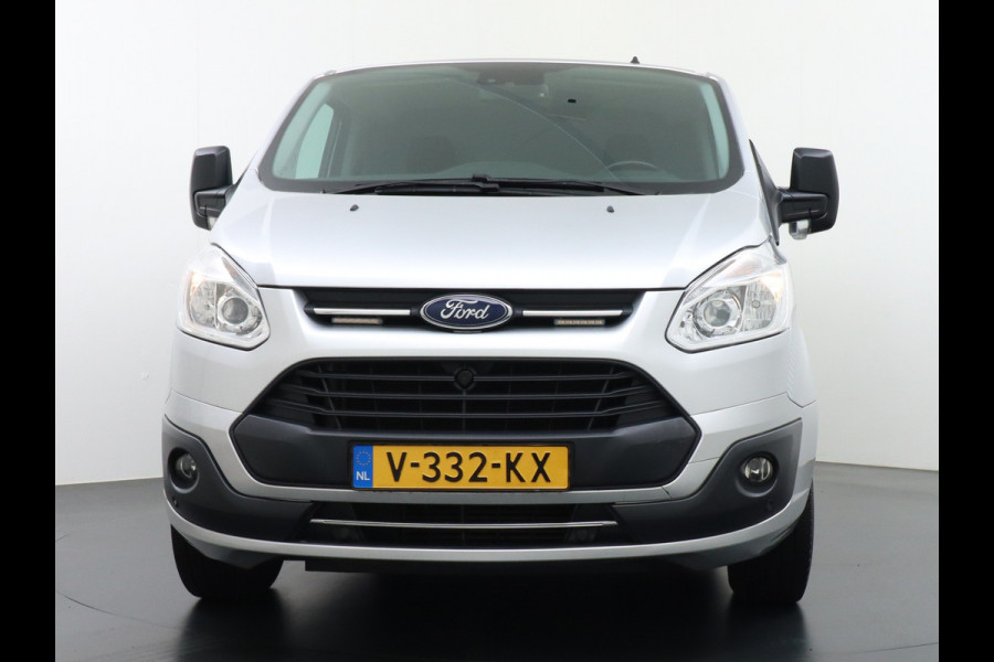 Ford Transit Custom Automaat 290 2.0TDCI 131PK L1H1 Navi Airco Cruise Camera Trekhaak Pdc Regen-/lichtsensor Euro 6 Trend Bluetooth Voorruit verwarmbaar Achterklep Zijschuifdeur Wandbetimmering Adaptieve bochtverl 1e Eigenaar Euro 6