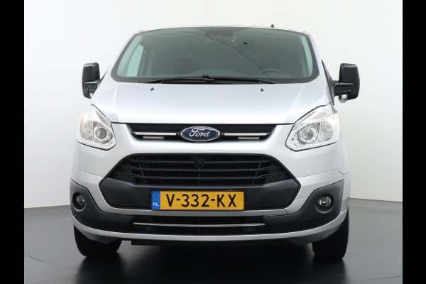 Ford Transit Custom Automaat 290 2.0TDCI 131PK L1H1 Navi Airco Cruise Camera Trekhaak Pdc Regen-/lichtsensor Euro 6 Trend Bluetooth Voorruit verwarmbaar Achterklep Zijschuifdeur Wandbetimmering Adaptieve bochtverl 1e Eigenaar Euro 6