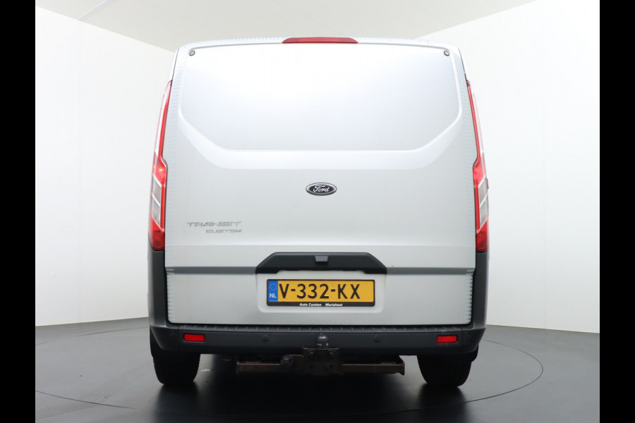 Ford Transit Custom Automaat 290 2.0TDCI 131PK L1H1 Navi Airco Cruise Camera Trekhaak Pdc Regen-/lichtsensor Euro 6 Trend Bluetooth Voorruit verwarmbaar Achterklep Zijschuifdeur Wandbetimmering Adaptieve bochtverl 1e Eigenaar Euro 6