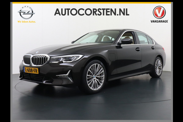 BMW 3-serie 330e 293PK Autom.8 Leder+Verwarmd+Elektr. Apple Carplay Android Auto Trekhaak Camera Adap.Cruise DAB+ Led Laserlicht Live cockpi Keyless Rijstrooksensor Audio Media Pack BMW individual Lmv 18" Comfort Access Digital Key Wifi Dealeronderhouden 1e Eigenaar Zeer compleet, nieuwprijs €66.055,-