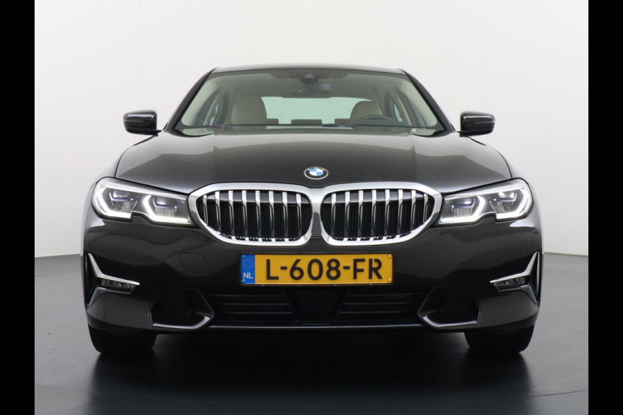 BMW 3-serie 330e 293PK Autom.8 Leder+Verwarmd+Elektr. Apple Carplay Android Auto Trekhaak Camera Adap.Cruise DAB+ Led Laserlicht Live cockpi Keyless Rijstrooksensor Audio Media Pack BMW individual Lmv 18" Comfort Access Digital Key Wifi Dealeronderhouden 1e Eigenaar Zeer compleet, nieuwprijs €66.055,-