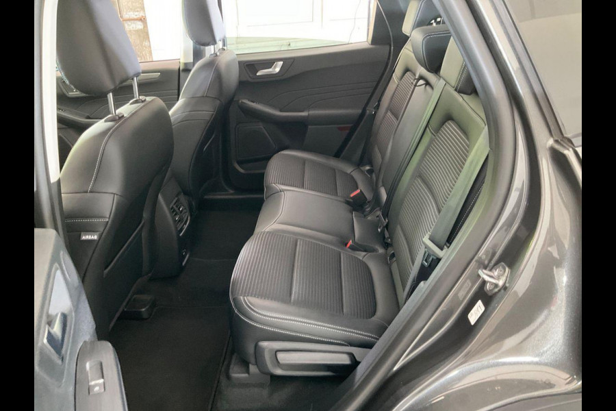 Ford Kuga 2.5 PHEV Titanium X | Weg/Uitklapbare Trekhaak (Elektrisch bedienbaar) | Adaptive cruise control | Winter Pack | Dodehoeksensoren | Bang&Olufsen | Head up Display | Half leder bekleding | 1.500 kg trekgewicht