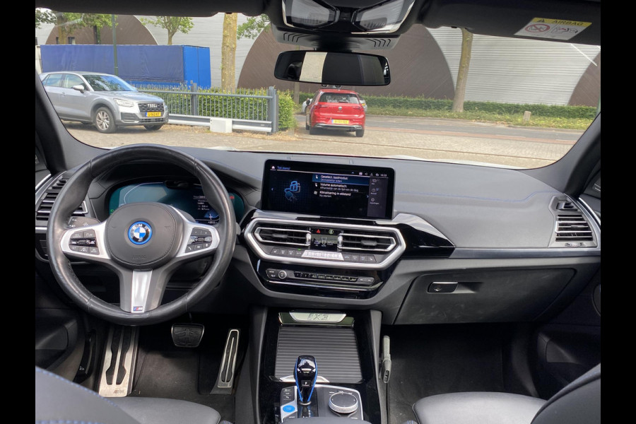 BMW iX3 High Executive 80 kWh M SPORT DEALER ONDERHOUDEN | MEGA COMPLEET (oa: DRIVING ASSIST.PROFF.-HARMAN KARDON-DODE HOEK-ELECTR.STOELEN-ADAPTIEF ONDERSTEL etc.) | RIJKLAARPIJS incl. 12mnd BOVAG