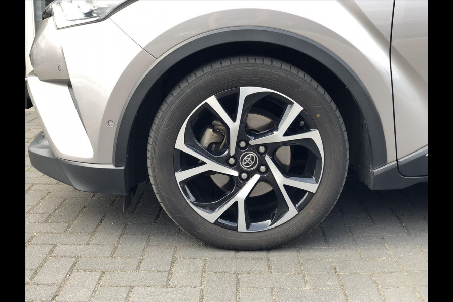 Toyota C-HR 1.8 Hybrid Style Bi-Tone | Trekhaak, JBL, LED Pakket, Navigatie, Dodehoekherkenning, Parkeersensoren, Stoel + Stuurverwarming