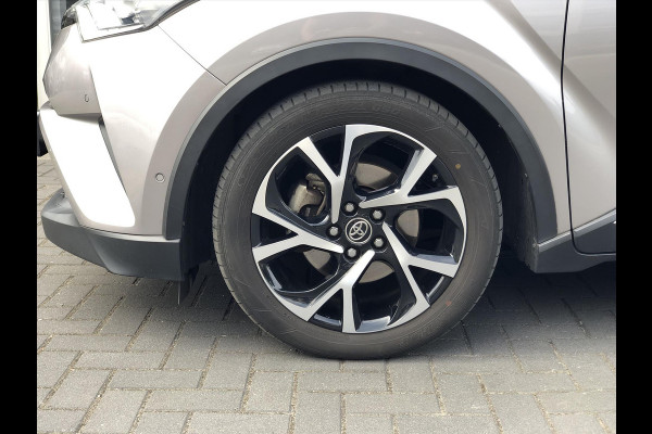 Toyota C-HR 1.8 Hybrid Style Bi-Tone | Trekhaak, JBL, LED Pakket, Navigatie, Dodehoekherkenning, Parkeersensoren, Stoel + Stuurverwarming