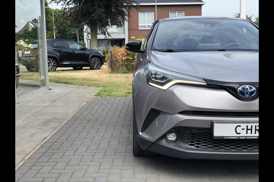 Toyota C-HR 1.8 Hybrid Style Bi-Tone | Trekhaak, JBL, LED Pakket, Navigatie, Dodehoekherkenning, Parkeersensoren, Stoel + Stuurverwarming