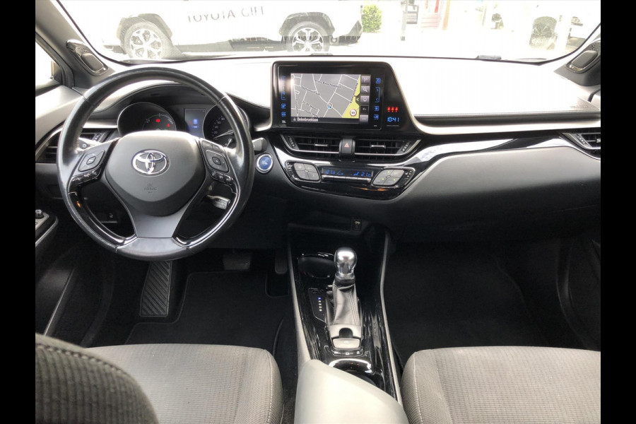 Toyota C-HR 1.8 Hybrid Style Bi-Tone | Trekhaak, JBL, LED Pakket, Navigatie, Dodehoekherkenning, Parkeersensoren, Stoel + Stuurverwarming