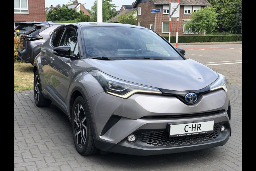 Toyota C-HR 1.8 Hybrid Style Bi-Tone | Trekhaak, JBL, LED Pakket, Navigatie, Dodehoekherkenning, Parkeersensoren, Stoel + Stuurverwarming