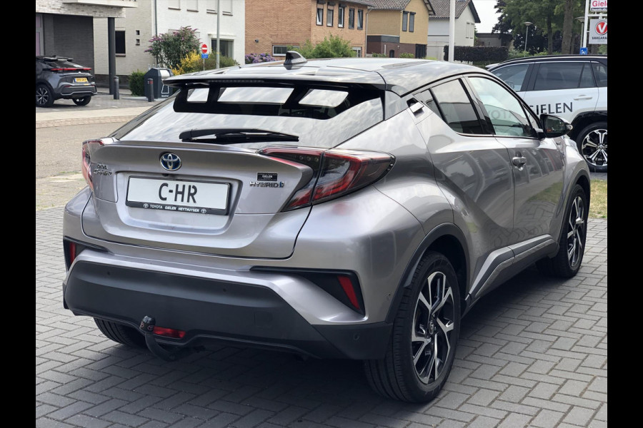 Toyota C-HR 1.8 Hybrid Style Bi-Tone | Trekhaak, JBL, LED Pakket, Navigatie, Dodehoekherkenning, Parkeersensoren, Stoel + Stuurverwarming