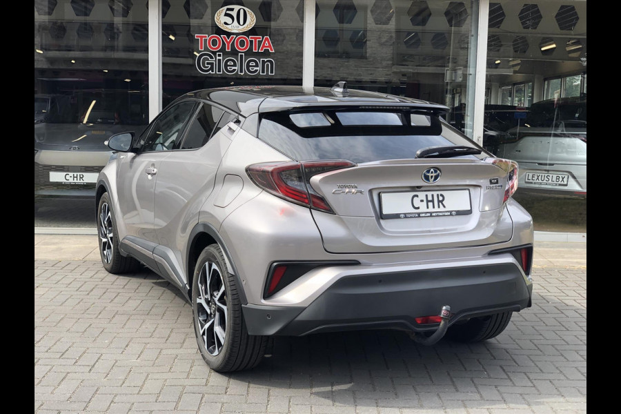 Toyota C-HR 1.8 Hybrid Style Bi-Tone | Trekhaak, JBL, LED Pakket, Navigatie, Dodehoekherkenning, Parkeersensoren, Stoel + Stuurverwarming