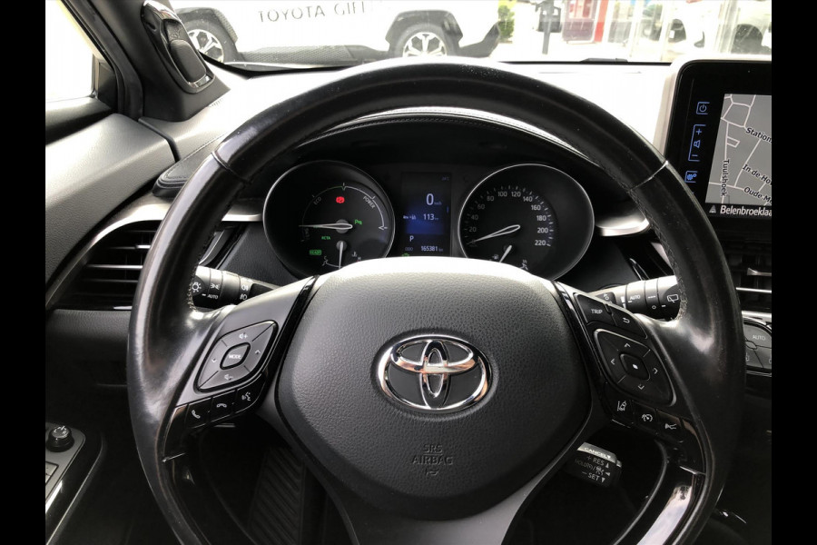 Toyota C-HR 1.8 Hybrid Style Bi-Tone | Trekhaak, JBL, LED Pakket, Navigatie, Dodehoekherkenning, Parkeersensoren, Stoel + Stuurverwarming