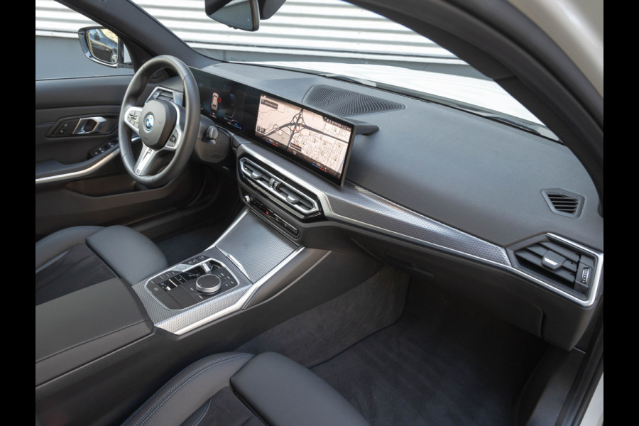 BMW 3 Serie Touring 330e M-Sport - ACC - Trekhaak - Hifi - Stuurwiel verwarmd - Camera