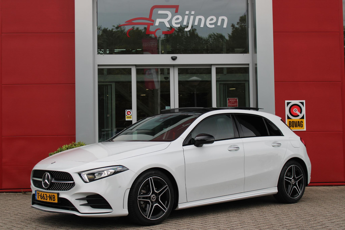 Mercedes-Benz A-Klasse 180 136PK AUTOMAAT AMG LINE | STERRENHEMEL! | PANORAMISCH SCHUIF/KANTEL DAK | SFEER VERLICHTING | NAVIGATIE | ACHTERUITRIJ CAMERA | PARKEERSENSOREN VOOR EN ACHTER | HIGH PERFORMANCE LED KOPLAMPEN | STOEL VERWARMING | KEYLESS - GO | SPIEGEL PAKKET | NIGHT PAKKET | LICHTMETALEN VELGEN 18" | EERSTE EIGENAAR! | Mercedes-Benz A-Klasse 180 136PK AUTOMAAT AMG LINE | STERRENHEMEL! | PANORAMISCH SCHUIF/KANTEL DAK | SFEER VERLICHTING | NAVIGATIE | ACHTERUITRIJ CAMERA | PARKEERSENSOREN VOOR EN ACHTER | HIGH PERFORMANCE LED KOPLAMPEN | STOEL VERWARMING | KEYLESS - GO | SPIEGEL PAKKET | NIGHT PAKKET | LICHTMETALEN VELGEN 18" | EERSTE EIGENAAR! |