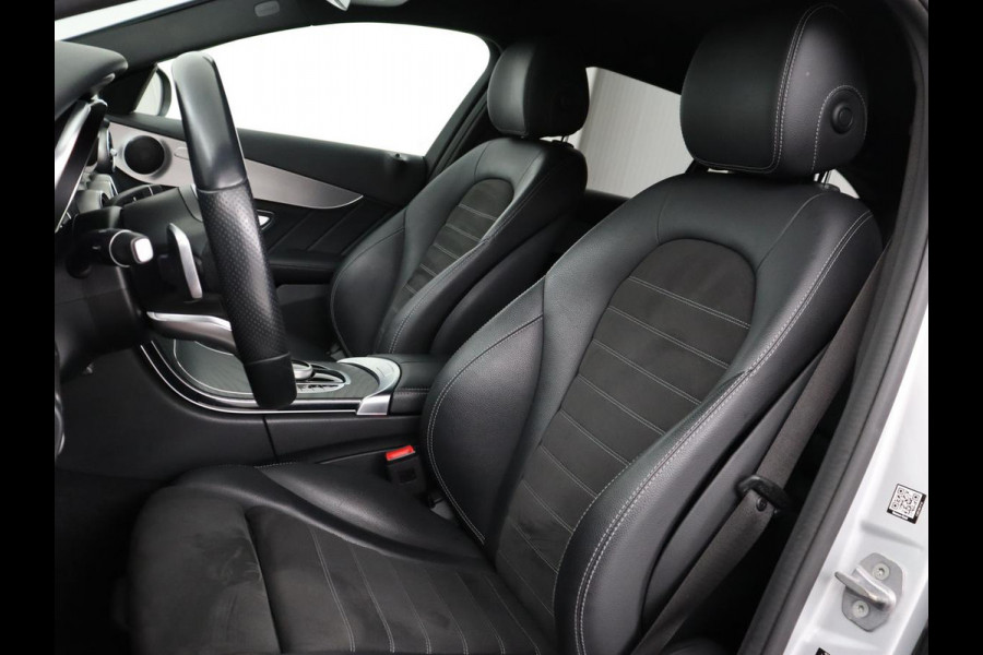 Mercedes-Benz C-Klasse 180 Business Solution AMG | Stoelverwarming | 360 Camera | Trekhaak | Digital Cockpit | Leder/Alcantara | Full LED | Navigatie | Park Assist