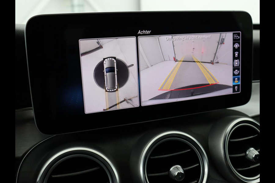 Mercedes-Benz C-Klasse 180 Business Solution AMG | Stoelverwarming | 360 Camera | Trekhaak | Digital Cockpit | Leder/Alcantara | Full LED | Navigatie | Park Assist