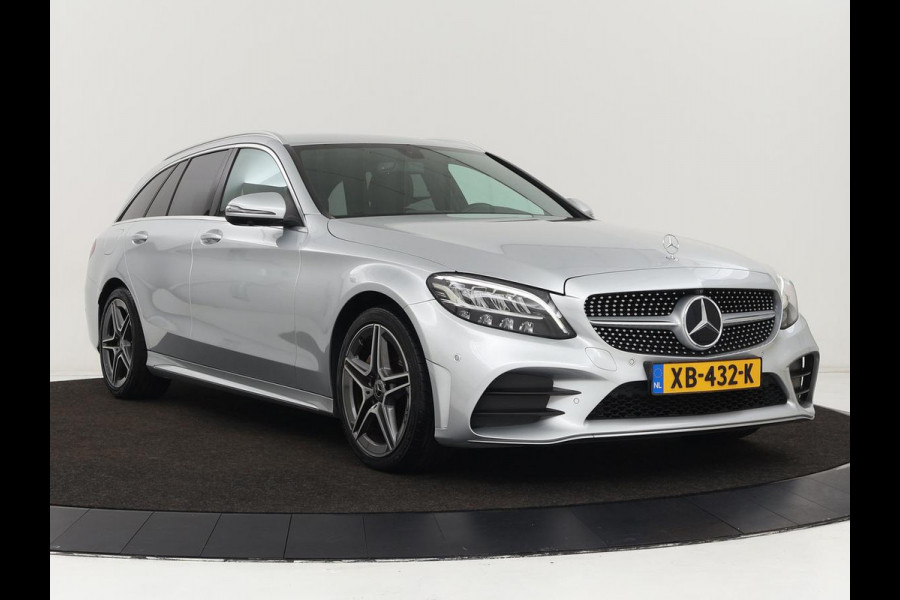 Mercedes-Benz C-Klasse 180 Business Solution AMG | Stoelverwarming | 360 Camera | Trekhaak | Digital Cockpit | Leder/Alcantara | Full LED | Navigatie | Park Assist