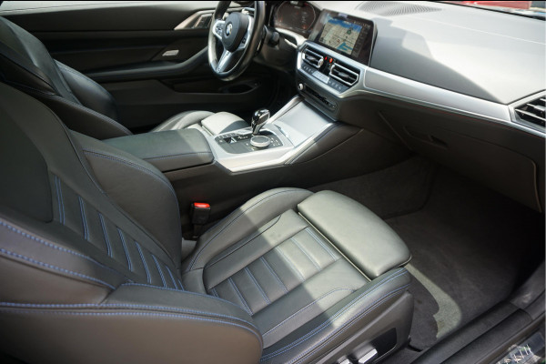 BMW 4 Serie Coupé M440i xDrive High Executive | M-SPORT | SAN REMO GRUN | Panoramadak | Harman Kardon | Head Up Display | Adaptieve demping | APPLE CarPlay | 360 graden Camera