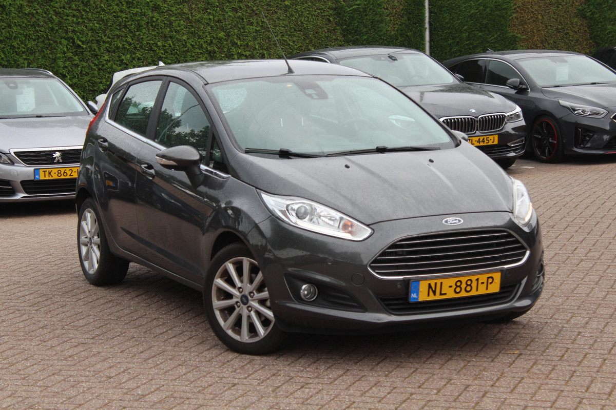 Ford Fiesta 1.0 EcoBoost Titanium Navigatie / Parkeerhulp achter / Bluetooth / 15'' / Cruise Control Ford Fiesta 1.0 EcoBoost Titanium Navigatie / Parkeerhulp achter / Bluetooth / 15'' / Cruise Control
