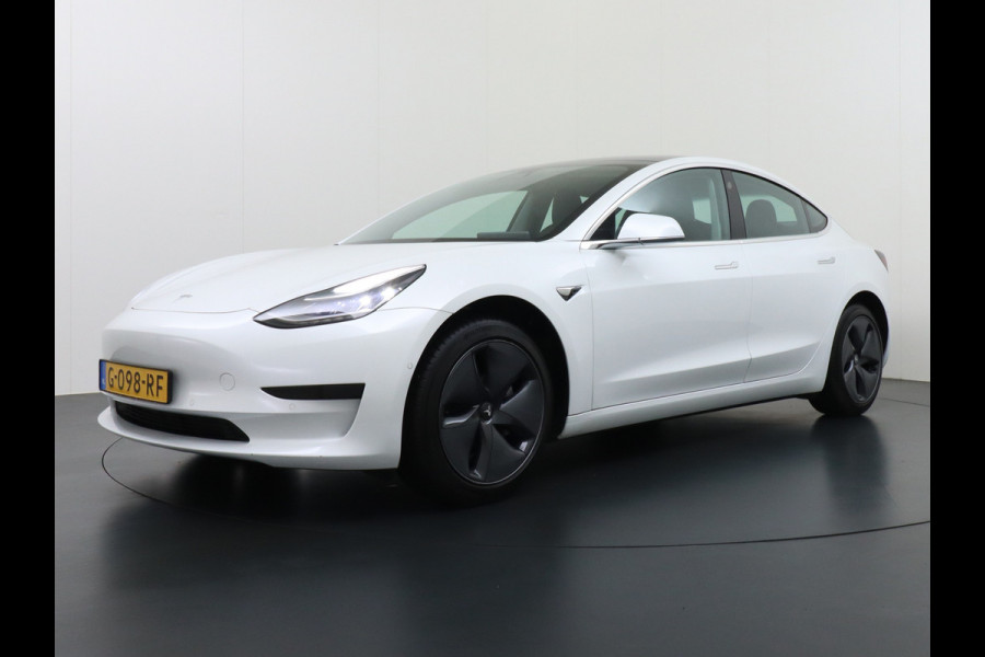 Tesla Model 3 RWD SR+ 60kWh 325PK Lmv 19" AutoPilot Leder PanoDak Adaptive-Cruise Lmv Camera's Elektr.-Stuur+Stoelen+Spiegels+Geheugen+Easy-En Navi LED Comfortstoelen ACC DAB Keyless en Voorverwarmen interieur via App One-Pedal-Drive Origineel Nederlandse auto 1e Eigenaar Garantie Accu/Motor tot 14-12-2027 max 160.000km 1.584kg licht!