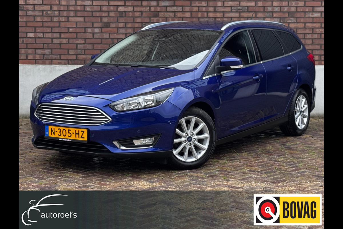 Ford FOCUS Wagon 1.0 Titanium / 125 PK / Trekhaak / Navigatie / Climate Control / Stoel + Stuurverwarming / Park Pilot