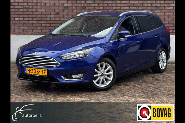 Ford FOCUS Wagon 1.0 Titanium / 125 PK / Trekhaak / Navigatie / Climate Control / Stoel + Stuurverwarming / Park Pilot