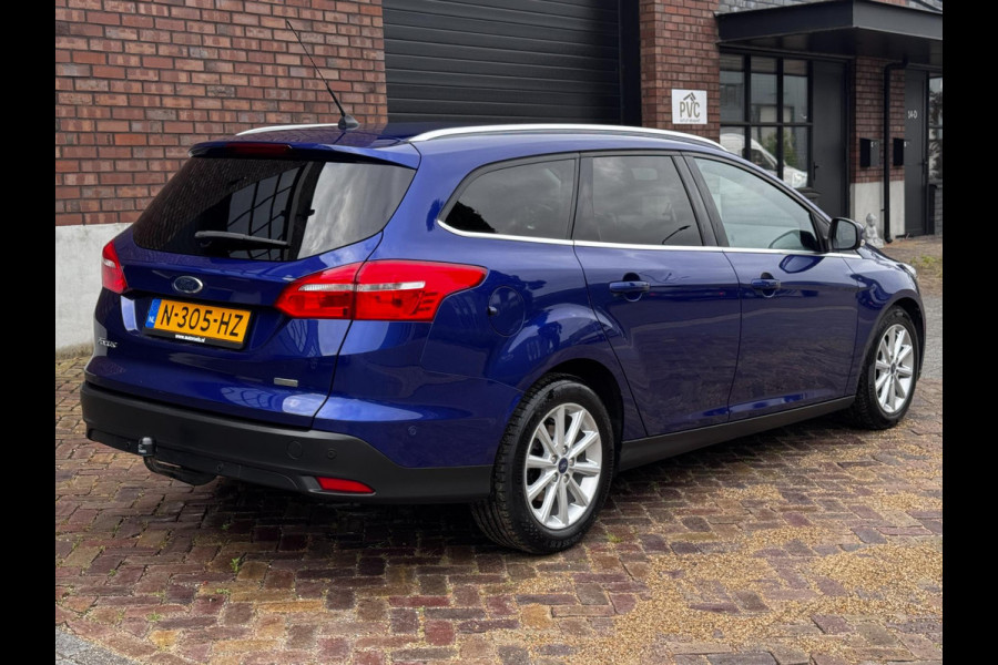 Ford FOCUS Wagon 1.0 Titanium / 125 PK / Trekhaak / Navigatie / Climate Control / Stoel + Stuurverwarming / Park Pilot