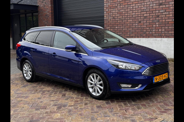 Ford FOCUS Wagon 1.0 Titanium / 125 PK / Trekhaak / Navigatie / Climate Control / Stoel + Stuurverwarming / Park Pilot