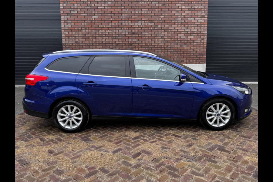 Ford FOCUS Wagon 1.0 Titanium / 125 PK / Trekhaak / Navigatie / Climate Control / Stoel + Stuurverwarming / Park Pilot