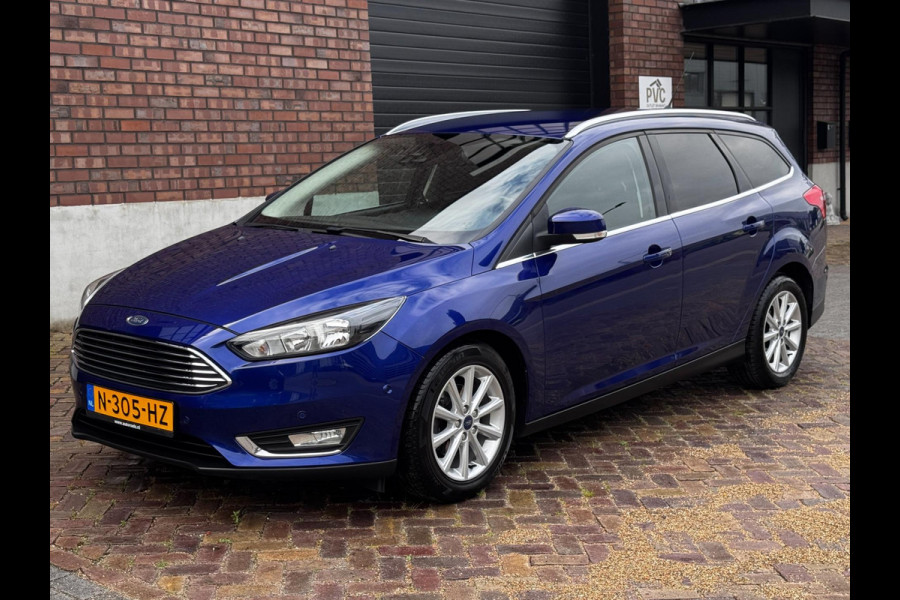 Ford FOCUS Wagon 1.0 Titanium / 125 PK / Trekhaak / Navigatie / Climate Control / Stoel + Stuurverwarming / Park Pilot