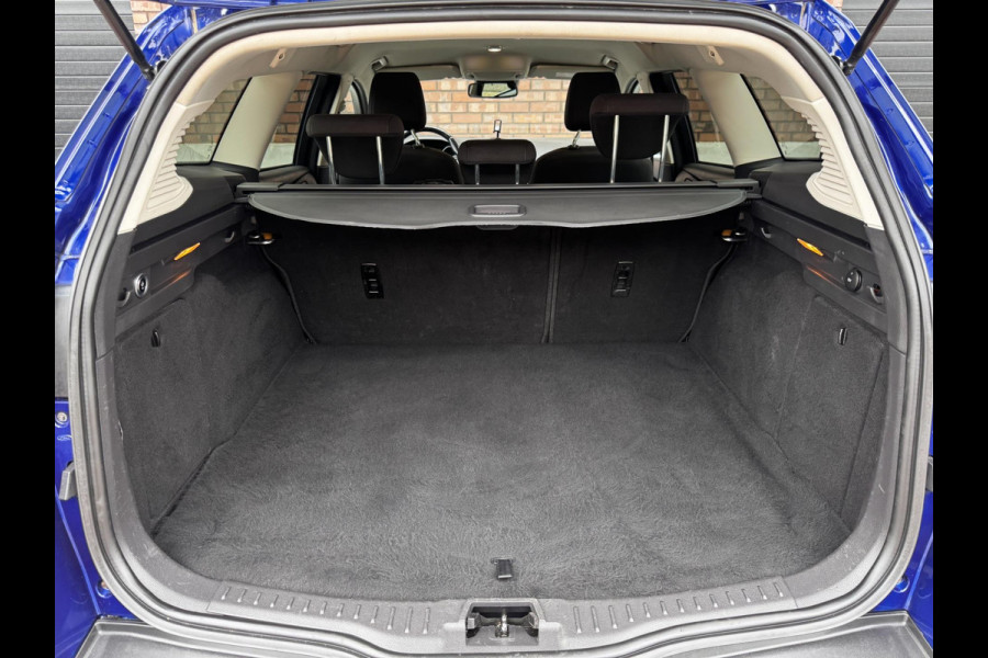Ford FOCUS Wagon 1.0 Titanium / 125 PK / Trekhaak / Navigatie / Climate Control / Stoel + Stuurverwarming / Park Pilot