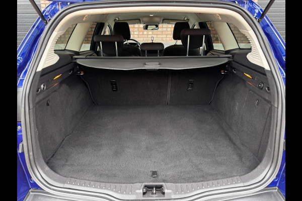 Ford FOCUS Wagon 1.0 Titanium / 125 PK / Trekhaak / Navigatie / Climate Control / Stoel + Stuurverwarming / Park Pilot