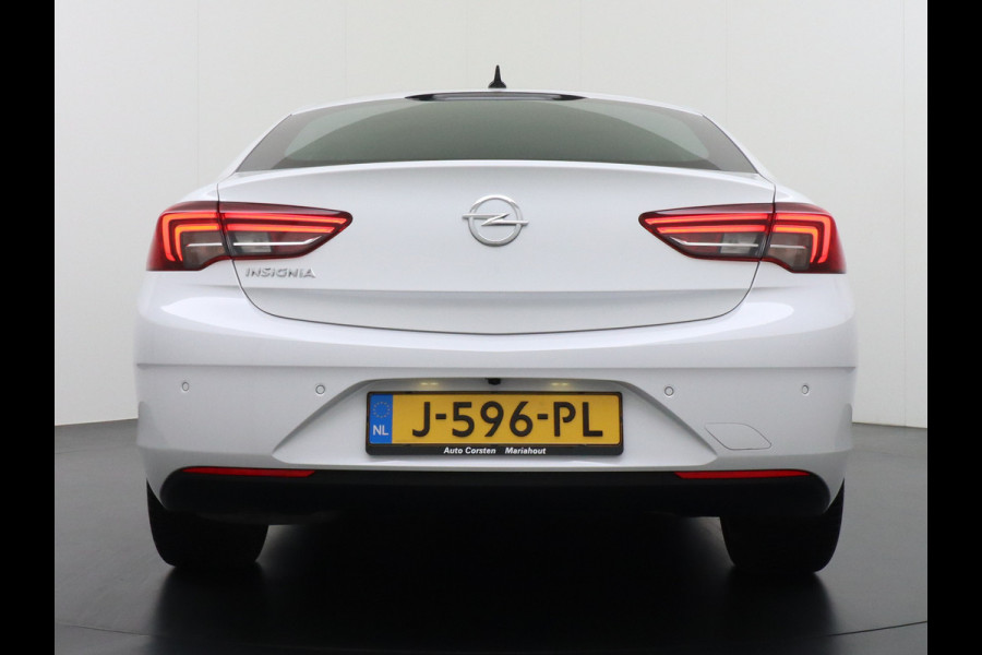 Opel Insignia Grand Sport T165PK Leer Camera Navi Apple Carplay Android PDC-a+v Trekhaak LED-v+a Ecc Cruise Control AGR-Comfort Stoelen Verwar Regen-Lichtsensor Sensor dodehoek Verkeersbordlezer Rijstrooksensor 1e Eigenaar