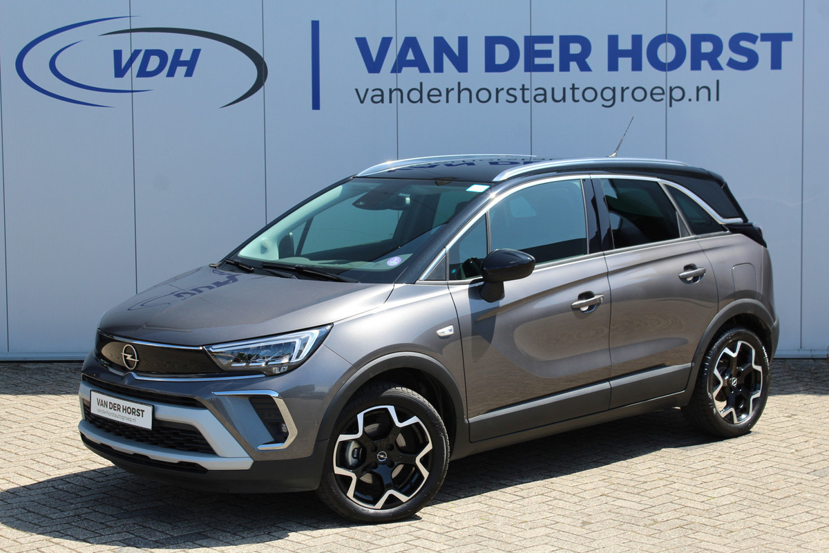Opel Crossland 1.2-110pk Turbo 'Elegance'. Mooie en luxe hoogzitter met weinig km's ! Volautm. airco dual, cruise control, camera, comfortstoelen, metallic lak, LM wielen, navigatie, telefoonvoorb., lane- en side assist, parkeersensoren v+a, LED verlichting etc. Opel Crossland 1.2-110pk Turbo 'Elegance'. Mooie en luxe hoogzitter met weinig km's ! Volautm. airco dual, cruise control, camera, comfortstoelen, metallic lak, LM wielen, navigatie, telefoonvoorb., lane- en side assist, parkeersensoren v+a, LED verlichting etc.