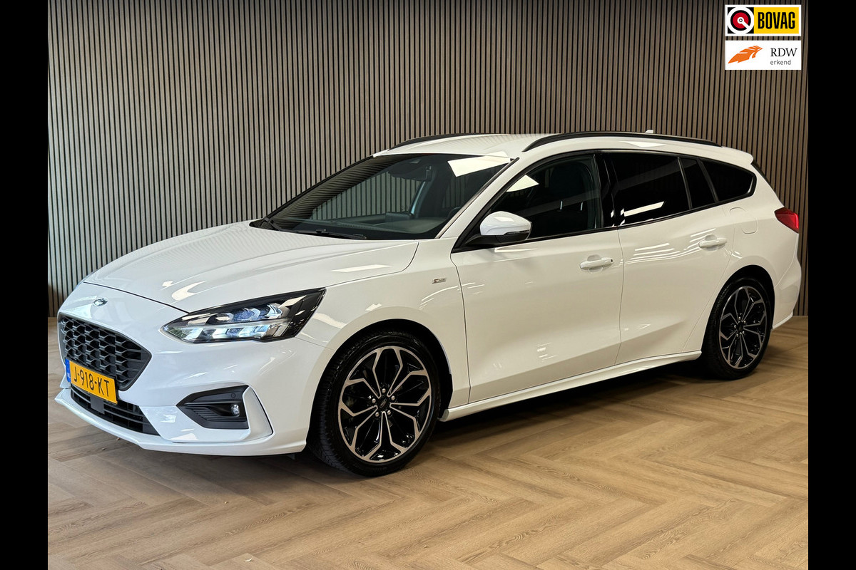Ford FOCUS Wagon 1.0 EcoBoost ST Line Business NAVIGATIE APPLE CARPLAY AIRCO PDC CRUISE START/STOP LANE-ASSIST KEYLESS-GO Ford FOCUS Wagon 1.0 EcoBoost ST Line Business NAVIGATIE APPLE CARPLAY AIRCO PDC CRUISE START/STOP LANE-ASSIST KEYLESS-GO