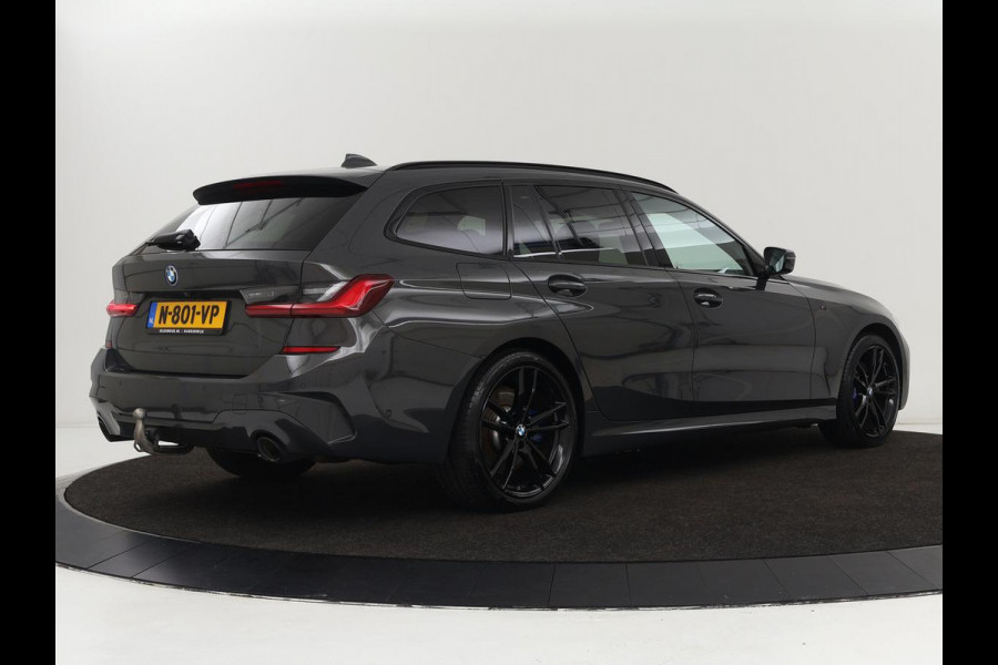 BMW 3-serie 320e M-Sport | Panoramadak | Adaptive cruise | Leder | Trekhaak | Head-Up | Camera | Stoel & stuurverwarming | Carplay | Navigatie | Sfeerverlichting | Live Cockpit