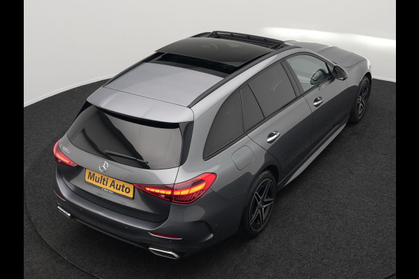 Mercedes-Benz C-Klasse Estate 300 e AMG Night Plug In Hybrid 320pk Dealer O.H. PHEV | Panodak | Trekhaak af Fabriek | Alcantara Sportstoelen Verwarmd | Sfeerverlichting | Navigatie | Apple Carplay | Virtual | Camera | DAB |