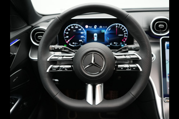 Mercedes-Benz C-Klasse Estate 300 e AMG Night Plug In Hybrid 320pk Dealer O.H. PHEV | Panodak | Trekhaak af Fabriek | Alcantara Sportstoelen Verwarmd | Sfeerverlichting | Navigatie | Apple Carplay | Virtual | Camera | DAB |