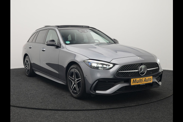 Mercedes-Benz C-Klasse Estate 300 e AMG Night Plug In Hybrid 320pk Dealer O.H. PHEV | Panodak | Trekhaak af Fabriek | Alcantara Sportstoelen Verwarmd | Sfeerverlichting | Navigatie | Apple Carplay | Virtual | Camera | DAB |