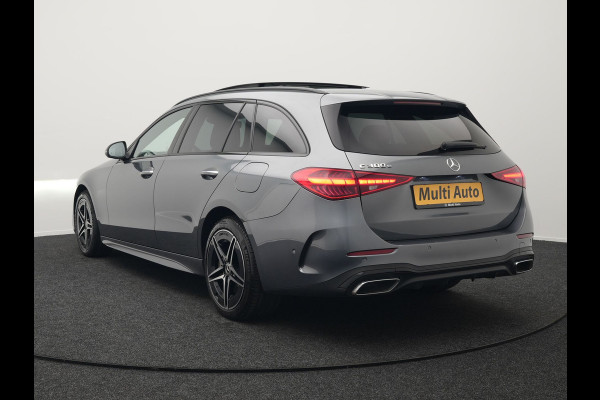 Mercedes-Benz C-Klasse Estate 300 e AMG Night Plug In Hybrid 320pk Dealer O.H. PHEV | Panodak | Trekhaak af Fabriek | Alcantara Sportstoelen Verwarmd | Sfeerverlichting | Navigatie | Apple Carplay | Virtual | Camera | DAB |