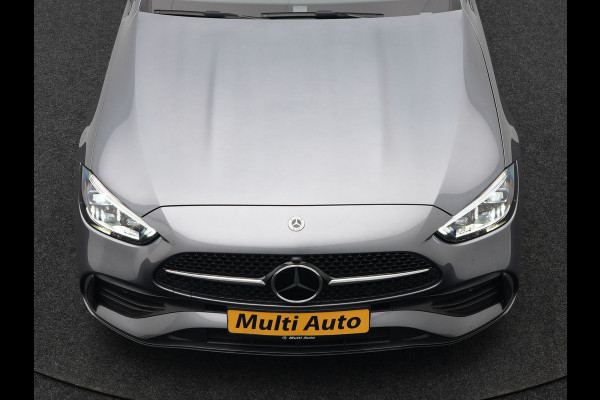 Mercedes-Benz C-Klasse Estate 300 e AMG Night Plug In Hybrid 320pk Dealer O.H. PHEV | Panodak | Trekhaak af Fabriek | Alcantara Sportstoelen Verwarmd | Sfeerverlichting | Navigatie | Apple Carplay | Virtual | Camera | DAB |