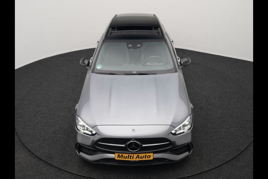 Mercedes-Benz C-Klasse Estate 300 e AMG Night Plug In Hybrid 320pk Dealer O.H. PHEV | Panodak | Trekhaak af Fabriek | Alcantara Sportstoelen Verwarmd | Sfeerverlichting | Navigatie | Apple Carplay | Virtual | Camera | DAB |