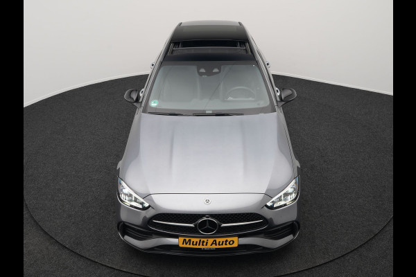 Mercedes-Benz C-Klasse Estate 300 e AMG Night Plug In Hybrid 320pk Dealer O.H. PHEV | Panodak | Trekhaak af Fabriek | Alcantara Sportstoelen Verwarmd | Sfeerverlichting | Navigatie | Apple Carplay | Virtual | Camera | DAB |