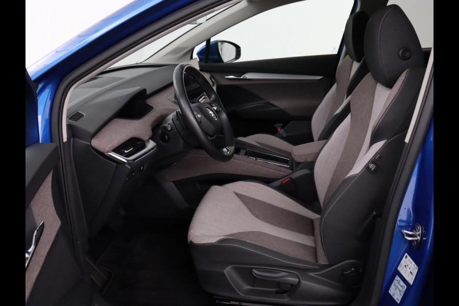 Škoda ENYAQ iV 60 | Stoel & stuurverwarming | Carplay | Keyless | Navigatie | Camera | Cruise control | Full LED | Parkeerhulp | 20'' lichtmetalen velgen