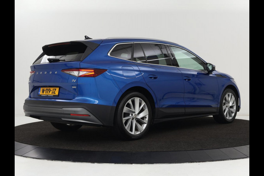 Škoda ENYAQ iV 60 | Stoel & stuurverwarming | Carplay | Keyless | Navigatie | Camera | Cruise control | Full LED | Parkeerhulp | 20'' lichtmetalen velgen