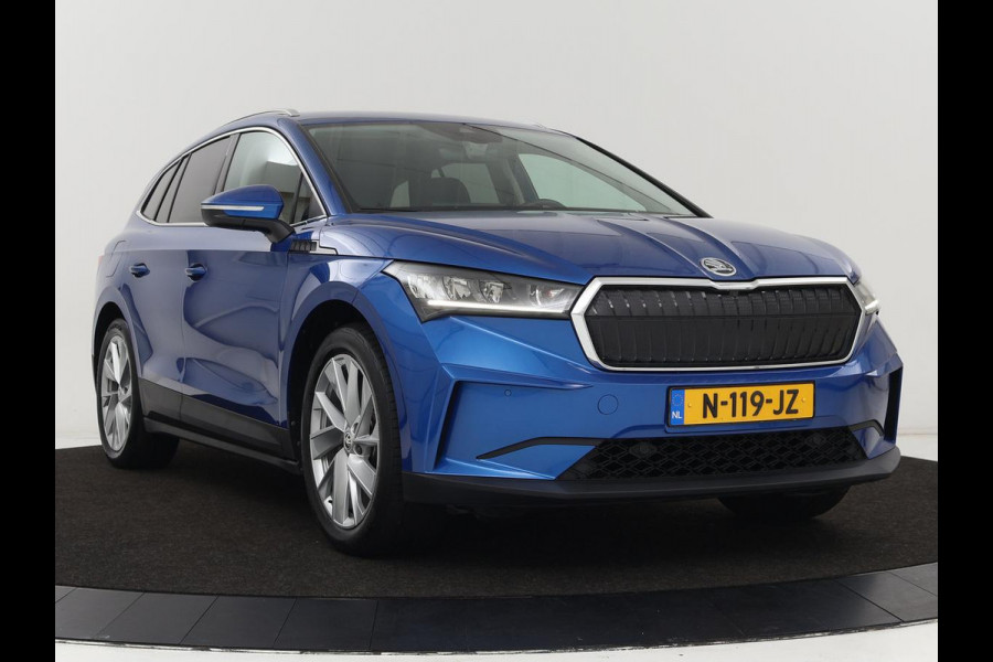 Škoda ENYAQ iV 60 | Stoel & stuurverwarming | Carplay | Keyless | Navigatie | Camera | Cruise control | Full LED | Parkeerhulp | 20'' lichtmetalen velgen