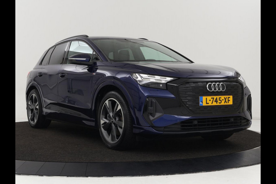 Audi Q4 e-tron 40 Launch edition S Competition 77 kWh | Stoelverwarming | Warmtepomp | Matrix LED | Carplay | Adaptive cruise | Navigatie | Virtual Cockpit | Half leder | Sportstoelen