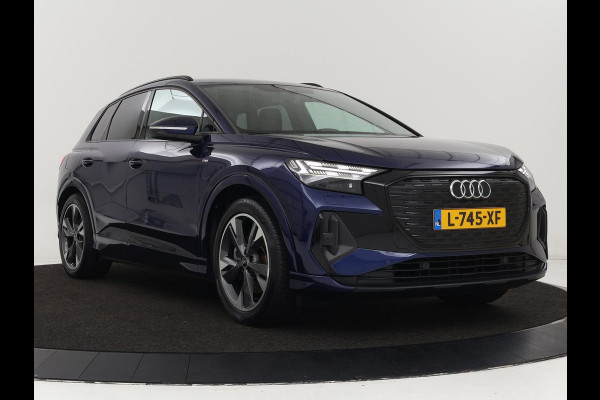 Audi Q4 e-tron 40 Launch edition S Competition 77 kWh | Stoelverwarming | Warmtepomp | Matrix LED | Carplay | Adaptive cruise | Navigatie | Virtual Cockpit | Half leder | Sportstoelen