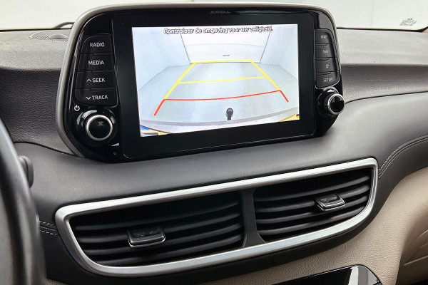 Hyundai Tucson 1.6 T-GDI Comfort(Goed onderH, Carplay, StoelV, Camera, Trekhaak, Navi, Elektrische stoelen, Parkeersensoren, Etc)