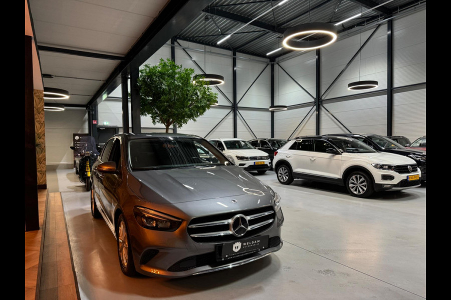 Mercedes-Benz B-Klasse 180 Business Solution Garantie Camera CarPlay PDC Sfeer Leder Lane Cruise Clima Navi Led Dab Rijklaar